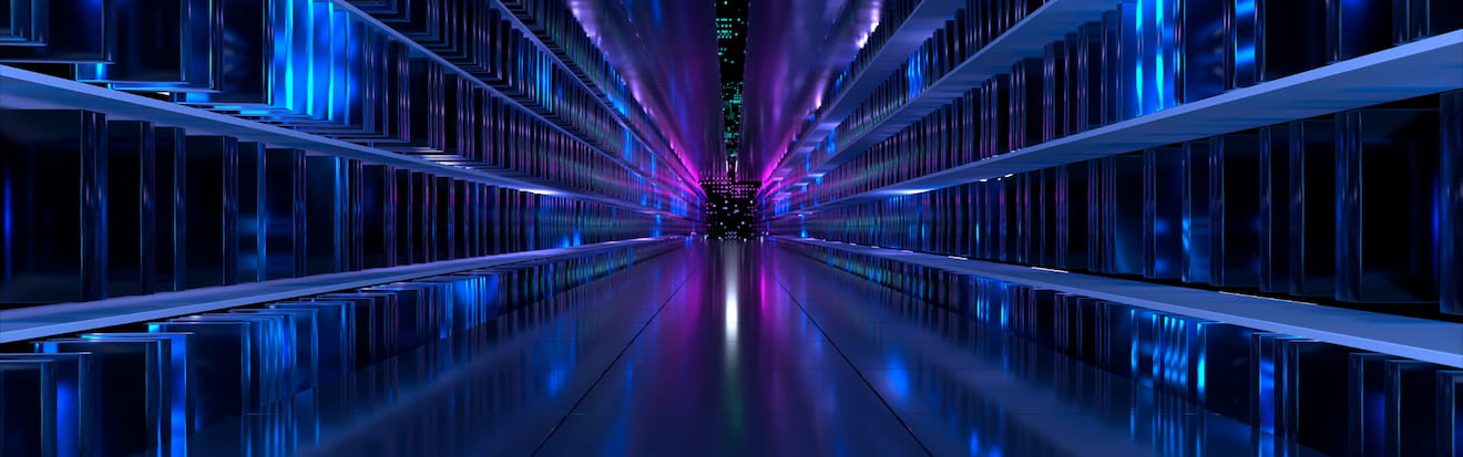 Pasillo futurista de servidores de datos, representando la infraestructura de la inteligencia artificial y la computación avanzada.